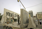 Baghdad Walls Come Tumbling Down                                                                    