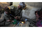 Opium Addict Gives Pipe to Grandson in Afghanistan                                                  