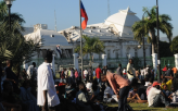 Haitians Camp in Front of Damaged National Palace                                                   